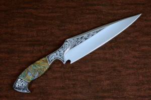 "Malaka" fine custom handmade knife, reverse side view  in hand-engraved CPM 154CM powder metal technology stainless steel, T4 deep cryogenically treated, bolsters of hand-engraved 304 stainless steel, Plasma agate and Nephrite Jade gemstone handle, hand-carved leather crossdraw sheath with stainless steel hardware