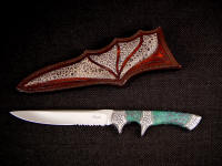 "Patriot" 440C high chromium hollow ground stainless steel blade, hand-engraved 304 stainless steel bolsters, Ruby in Zoisite Gemstone handle, Frog skin inlaid in hand-carved leather sheath