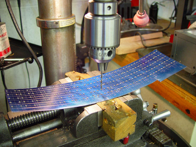 Drilling holes of retainer plates in stainless sheet metal