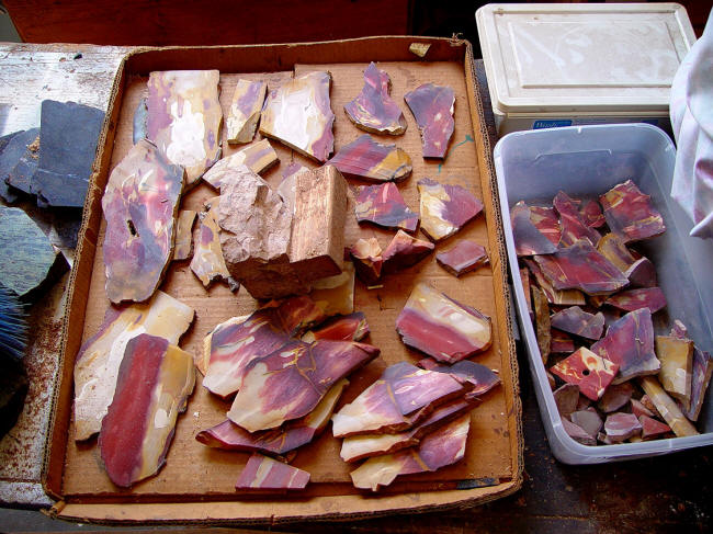 Slabbing, blocking Mookaite Jasper gemstone in the studio