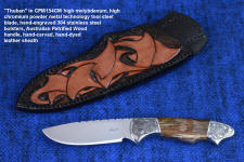 "Thuban" obverse side view in CPM154CM high molybdenum powder metal technology stainless tool steel blade, hand-engraved 304 stainless steel bolsters, Australian Petrified Wood gemstone handle, hand-carved, hand-dyed leather sheath